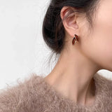 Golden Geometric Leaf Stud Earrings