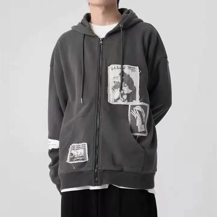 Model wearing the gray Graphic Patchwork Zip-Up Sweatshirt