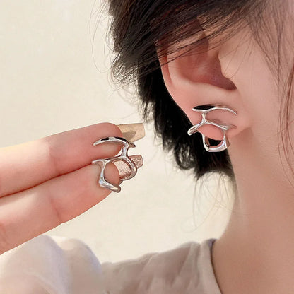 Model wearing the Y2K Neo Glam Earrings