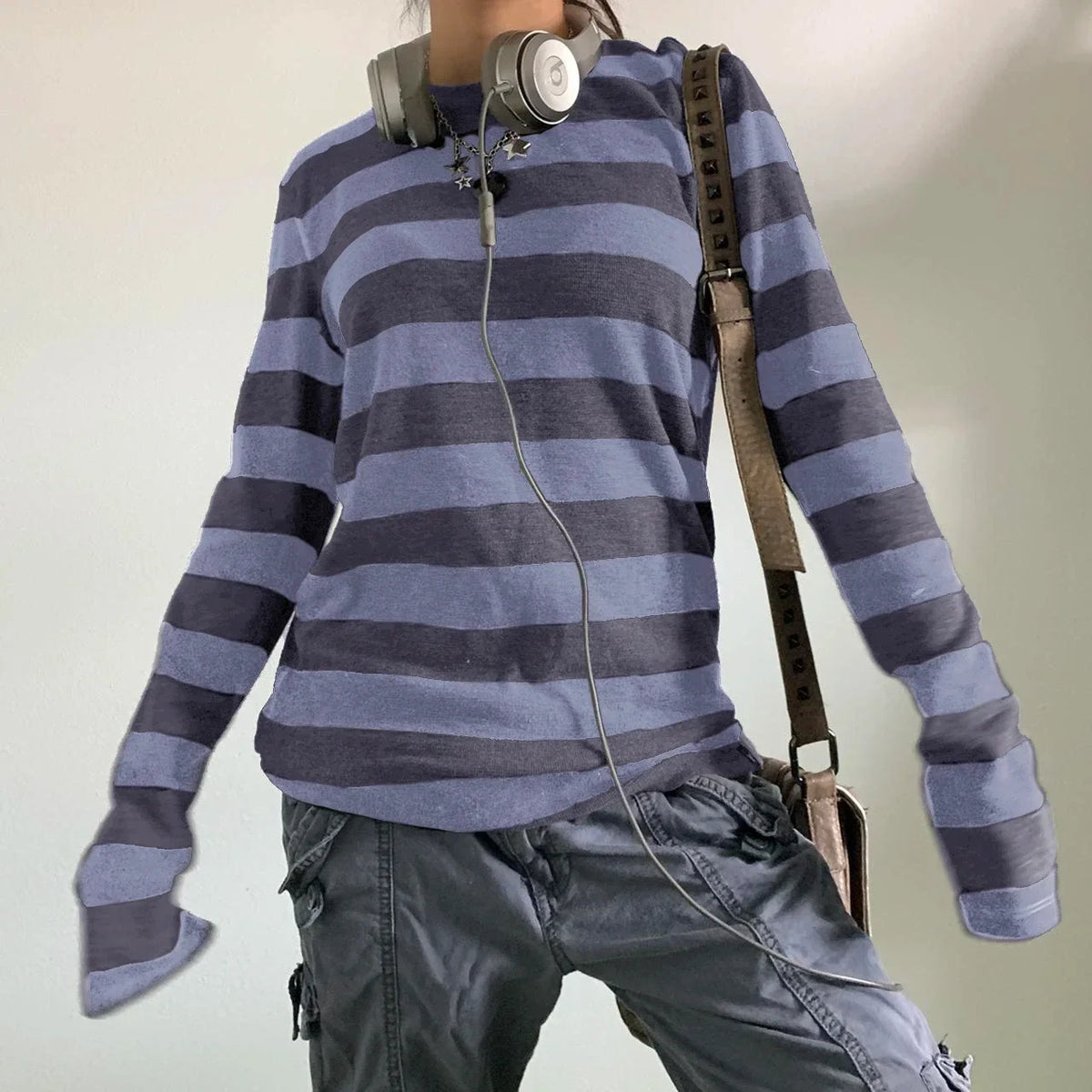 Model wearing the blue Artisan's Craft T-Shirt