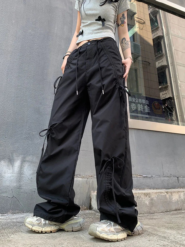 Model wearing the black Tailored Cargo Utility Pants