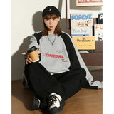 Model wearing the gray Urban Adventure Sweatshirt