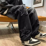Model wearing the black Star-Patterned Jeans