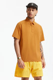 Model wearing the orange Modern Fit Polo Shirt