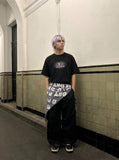 DAXUEN Relaxed-fit short-sleeved graphic T-shirt — model photo