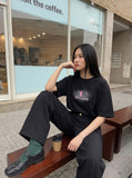 DAXUEN Relaxed-fit short-sleeved graphic T-shirt — model photo