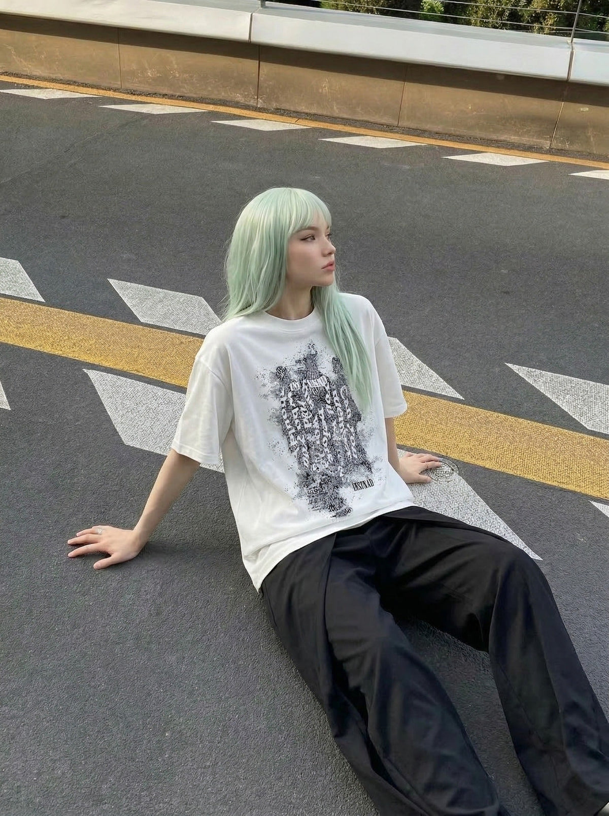 Oversized short-sleeved t-shirt with glitch graphic — model photo