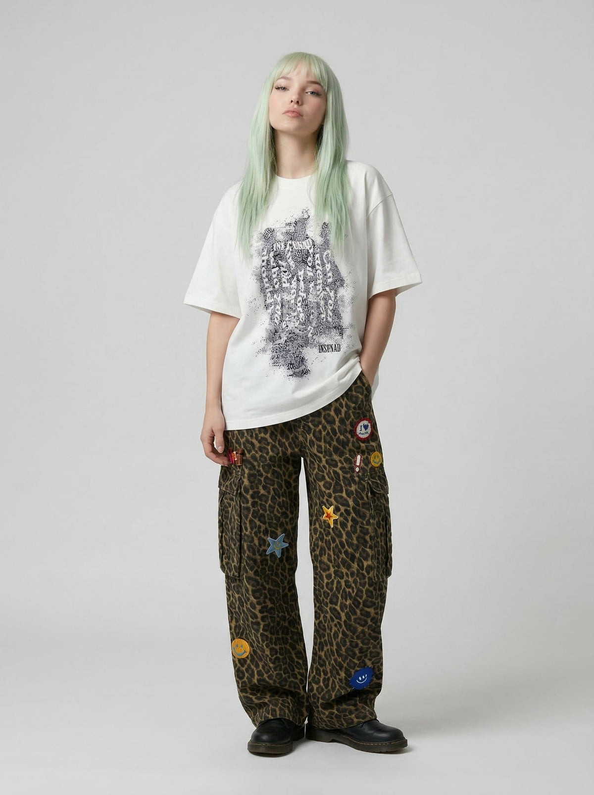 Oversized short-sleeved t-shirt with glitch graphic — model photo
