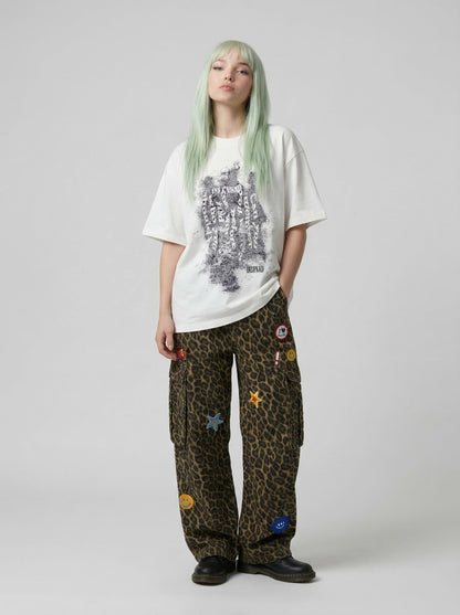 Oversized short-sleeved t-shirt with glitch graphic — model photo
