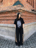 Oversized short-sleeved t-shirt with glitch graphic — model photo