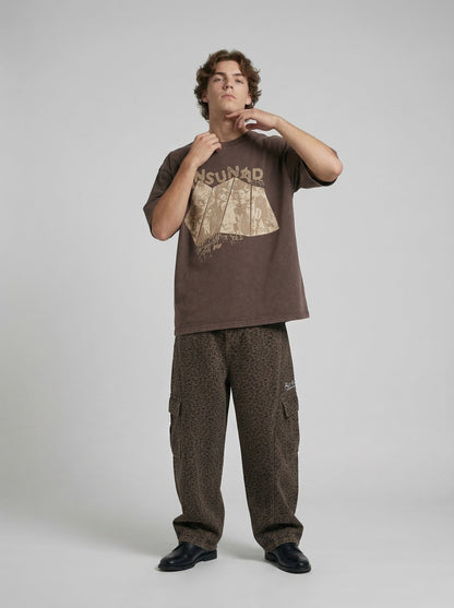 Oversized graphic T-shirt with distressed print — model photo