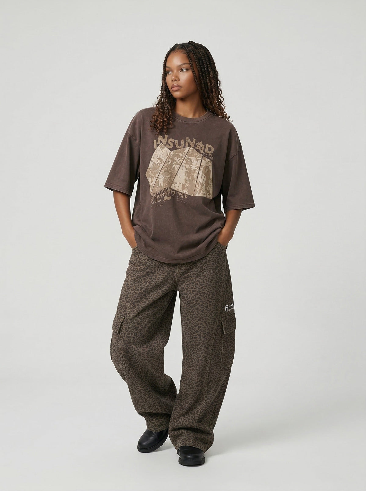 Oversized graphic T-shirt with distressed print — model photo