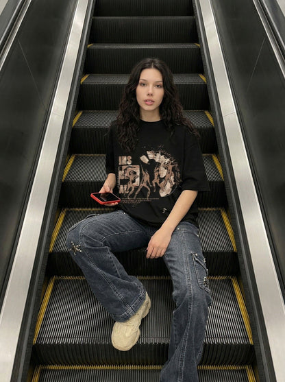 Oversized black and white t-shirt with graphic design — model photo