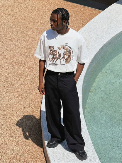 Oversized black and white t-shirt with graphic design — model photo