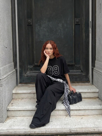 DAXUEN Short-sleeve oversized t-shirt with graphic design — model photo