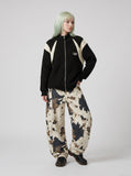 DAXUEN black angular panel knit zip jacket — model photo