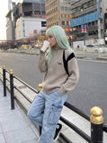 DAXUEN black angular panel knit zip jacket — model photo