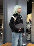 DAXUEN black angular panel knit zip jacket — model photo