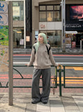DAXUEN black angular panel knit zip jacket — model photo