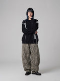 DAXUEN black oversized patchwork knit sweater — model photo