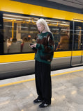 DAXUEN camouflage fuzzy knit sweater — model photo