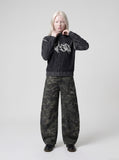 DAXUEN black vertical ribbed abstract graphic mock neck sweater — model photo