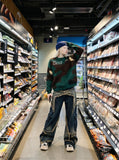 DAXUEN camouflage fuzzy knit sweater — model photo