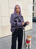 DAXUEN grey oversized distressed skull graphic sweater — model photo