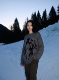 DAXUEN dark grey oversized distressed graphic knit sweater — model photo