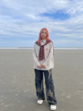 DAXUEN cream long-sleeve shirt with red circular embroidery — model photo