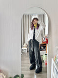 DAXUEN black textured long-sleeved button-up shirt — model photo