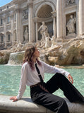 DAXUEN black textured long-sleeved button-up shirt — model photo