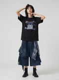 DAXUEN black oversized abstract brushstroke graphic tee — model photo