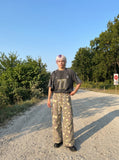 DAXUEN greenish-beige abstract camouflage wide-leg cargo pants — model photo