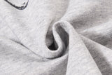 DAXUEN heather grey abstract clef and star graphic long sleeve polo