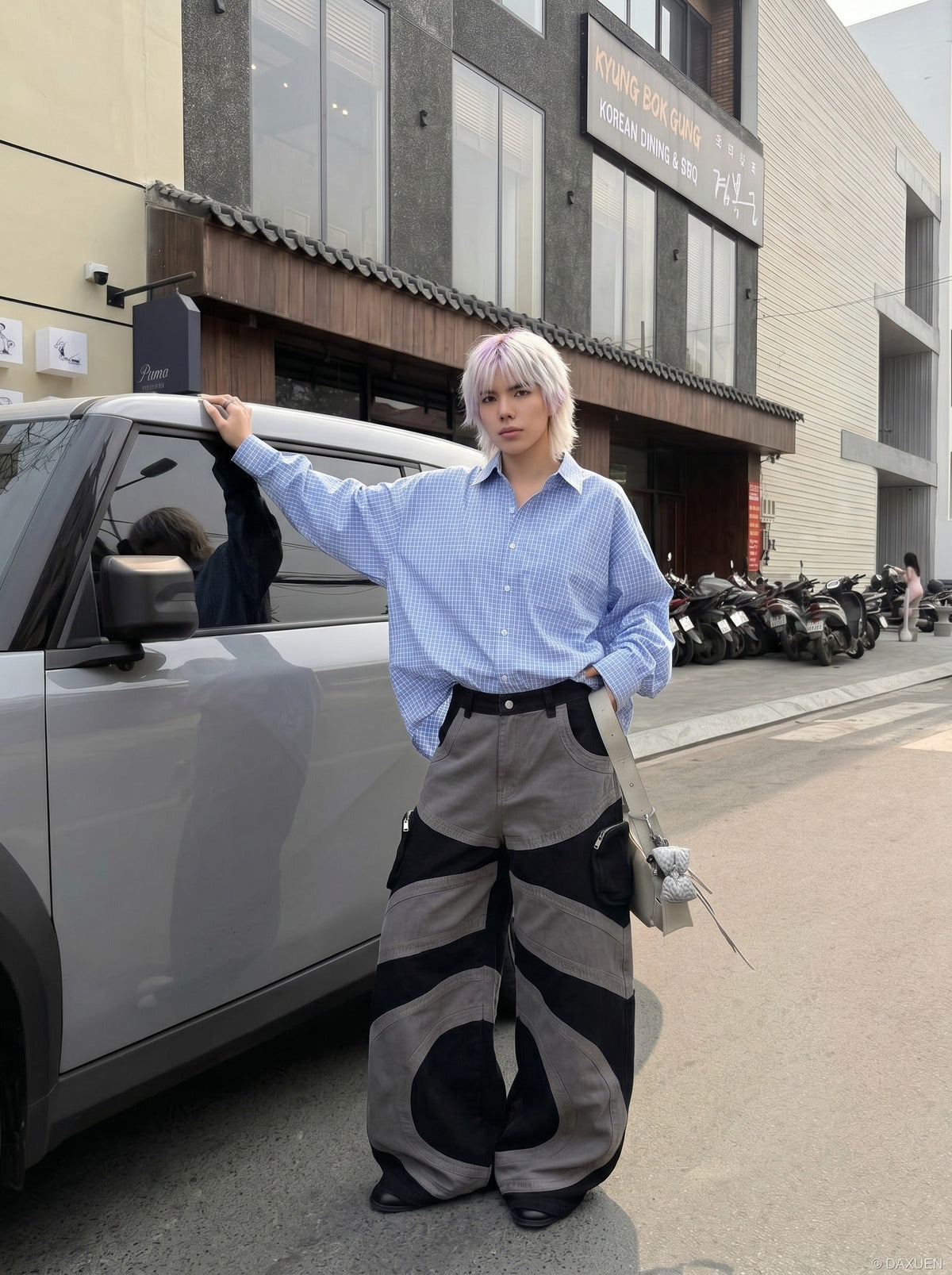 DAXUEN Wide-leg color-block pants with abstract pattern — model photo