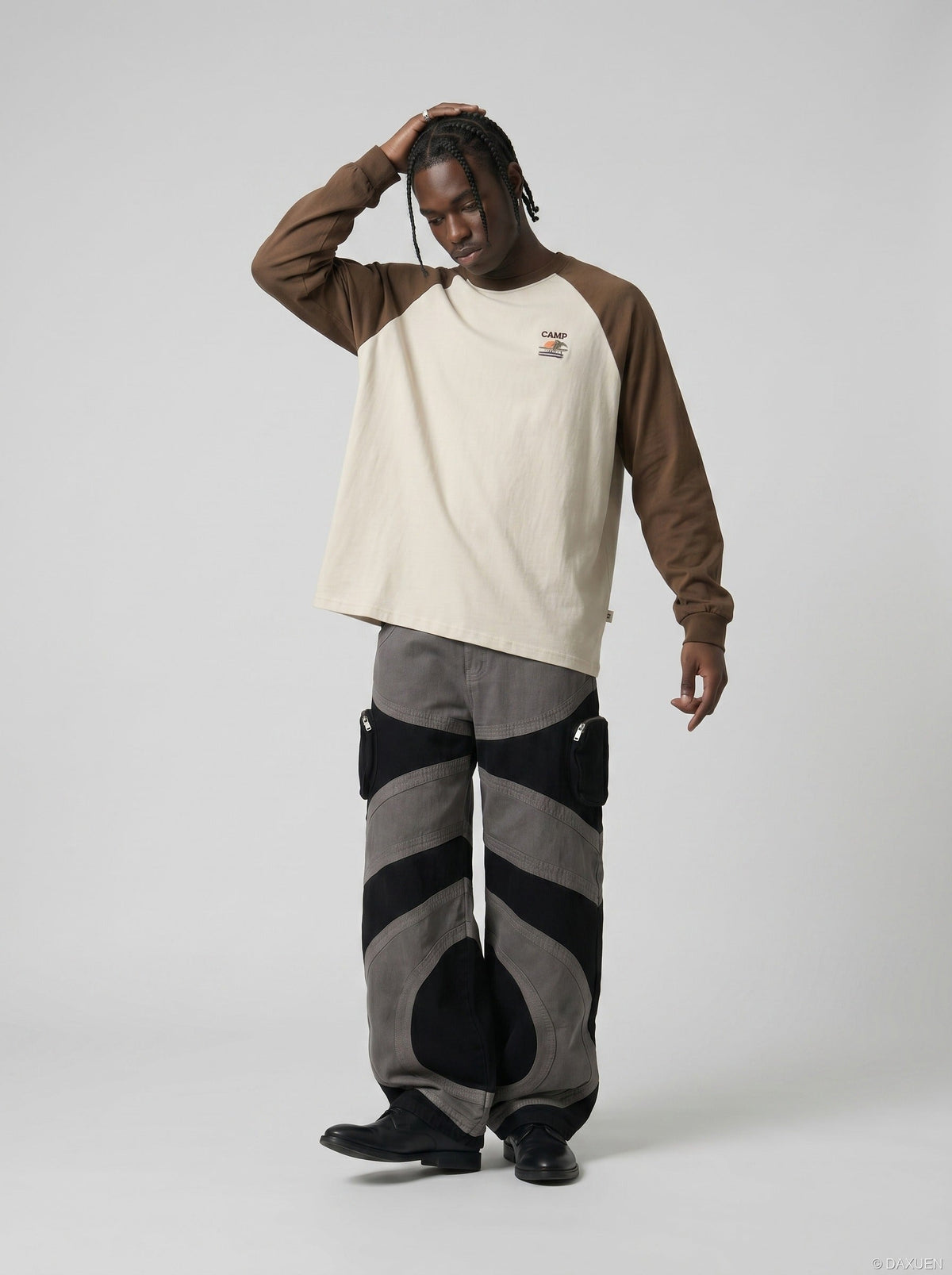 DAXUEN Wide-leg color-block pants with abstract pattern — model photo