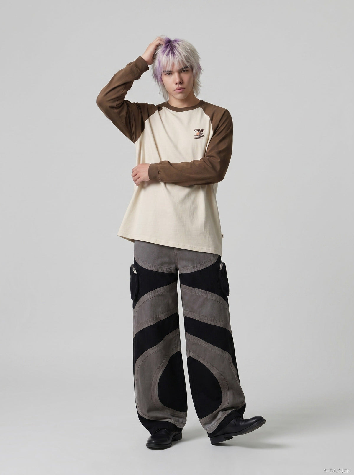 DAXUEN Wide-leg color-block pants with abstract pattern — model photo
