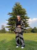 DAXUEN Wide-leg color-block pants with abstract pattern — model photo