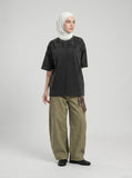 DAXUEN dark charcoal oversized abstract drip print tee — model photo