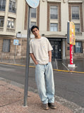 DAXUEN Oversized short-sleeve T-shirt with embroidery — model photo