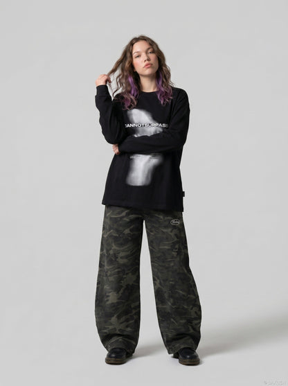 DAXUEN black oversized abstract ghostly graphic top — model photo