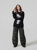DAXUEN black oversized abstract ghostly graphic top — model photo