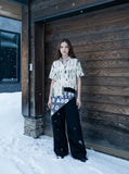 DAXUEN Short-sleeved button-up shirt with abstract print — model photo