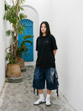 DAXUEN black oversized abstract graphic tee — model photo