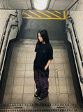 DAXUEN black oversized abstract graphic tee — model photo