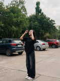 DAXUEN black oversized abstract graphic tee — model photo