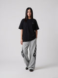 DAXUEN black oversized abstract graphic tee — model photo