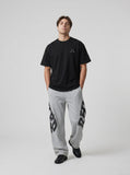 DAXUEN black oversized abstract graphic tee — model photo