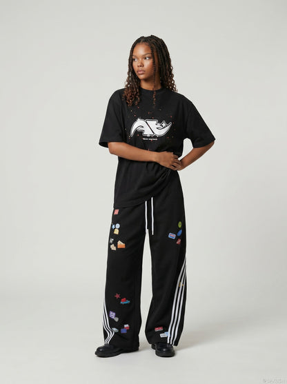 DAXUEN Abstract graphic paint splash short-sleeved T-shirt — model photo